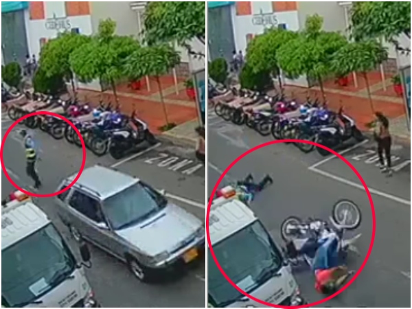 Agente De Transito En Barrancabermeja Hace Caer A Motociclista.jpg